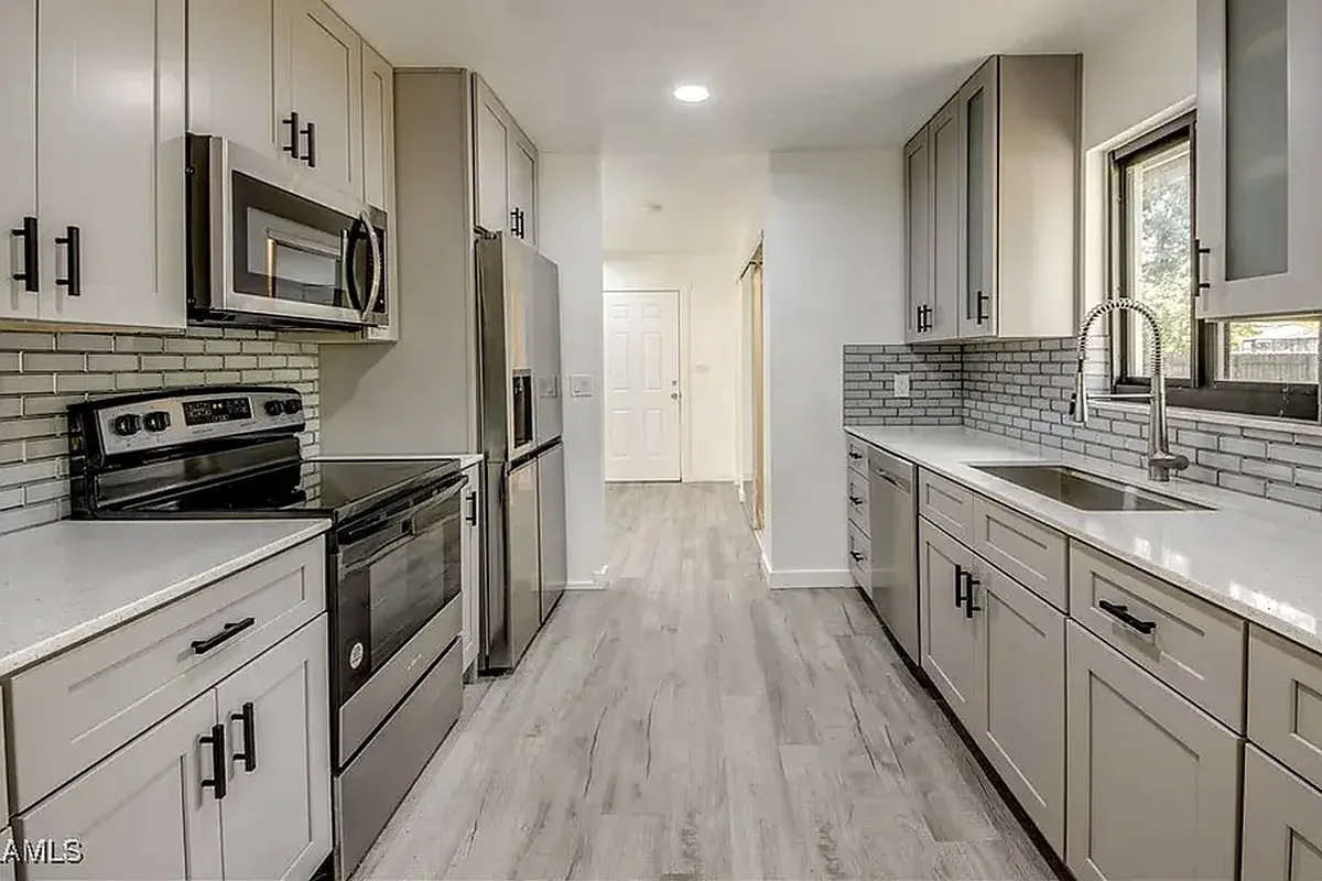 North Port finished flooring example: Kitchen flooring should be left clean, usable and visually connected to nearby living areas.