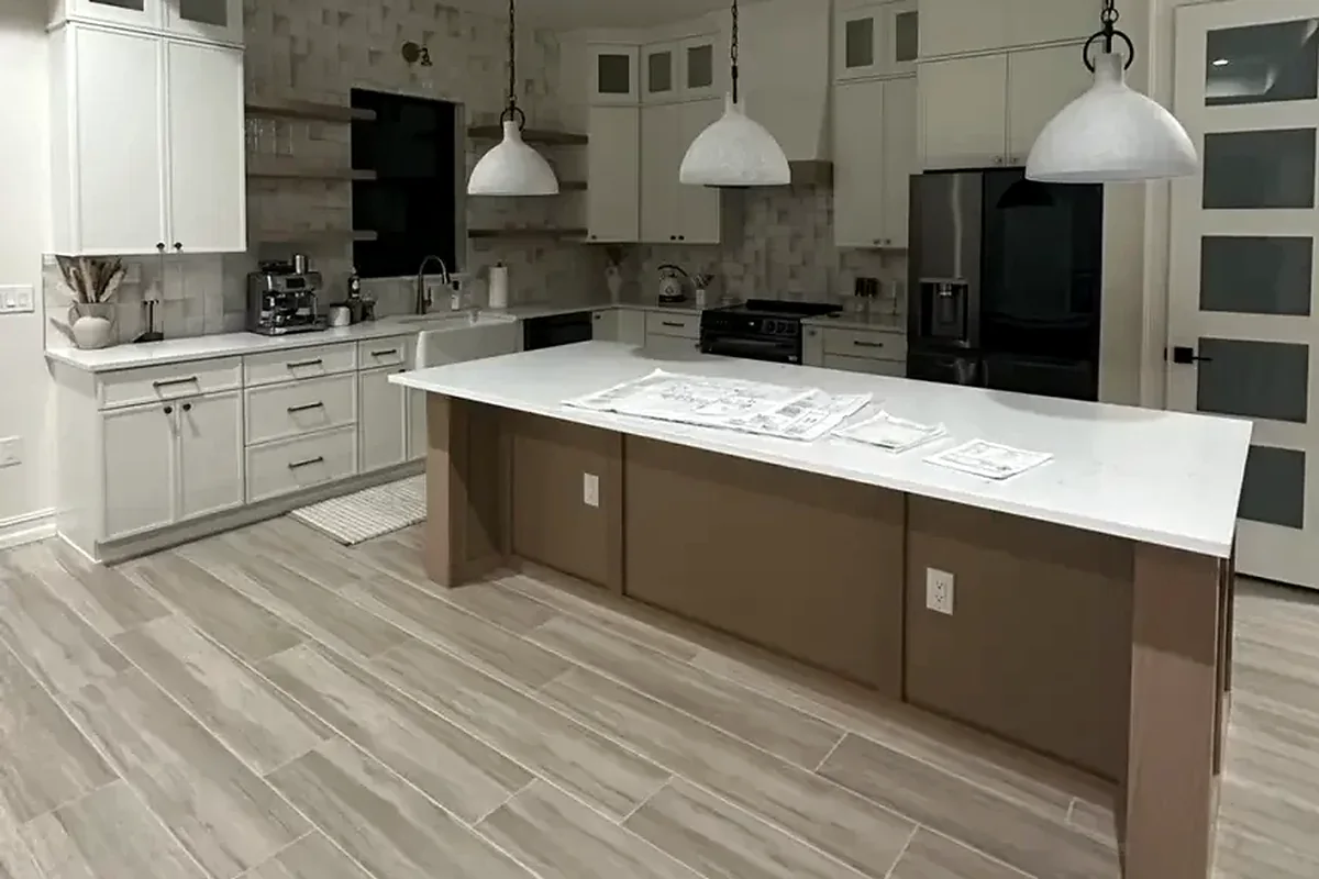 Punta Gorda finished flooring example: Kitchen flooring must connect neatly with cabinets, walls and adjoining rooms.